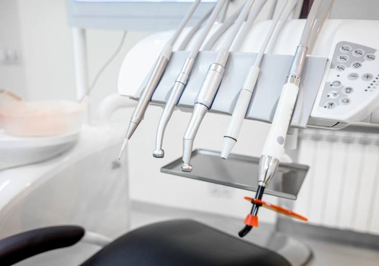 Row of technological instruments in dental treatment area