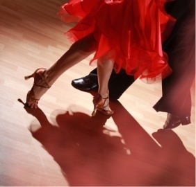 Close up of the legs of a man and woman dancing