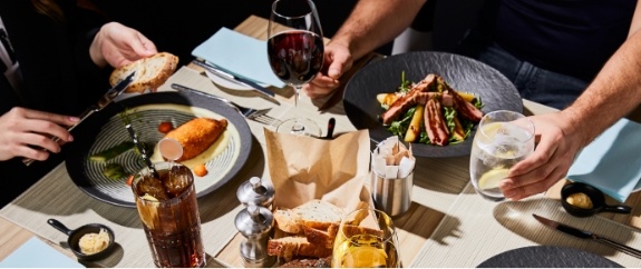 Table filled with lunch food at a restaurant