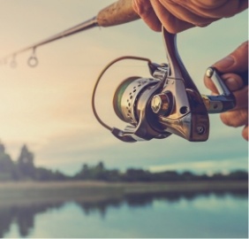 Person casting a fishing rod